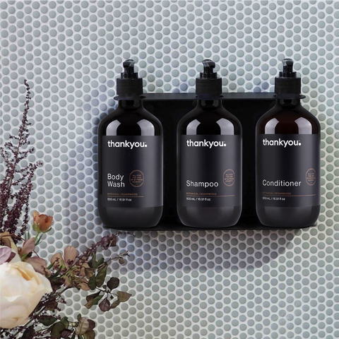 triple soap dispenser holding thankyou amenities 500ml body wash, shampoo and conditioner