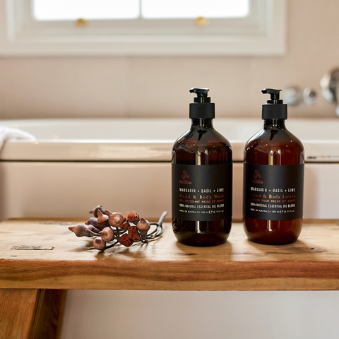 Urban Rituelle body wash and lotion next to bath